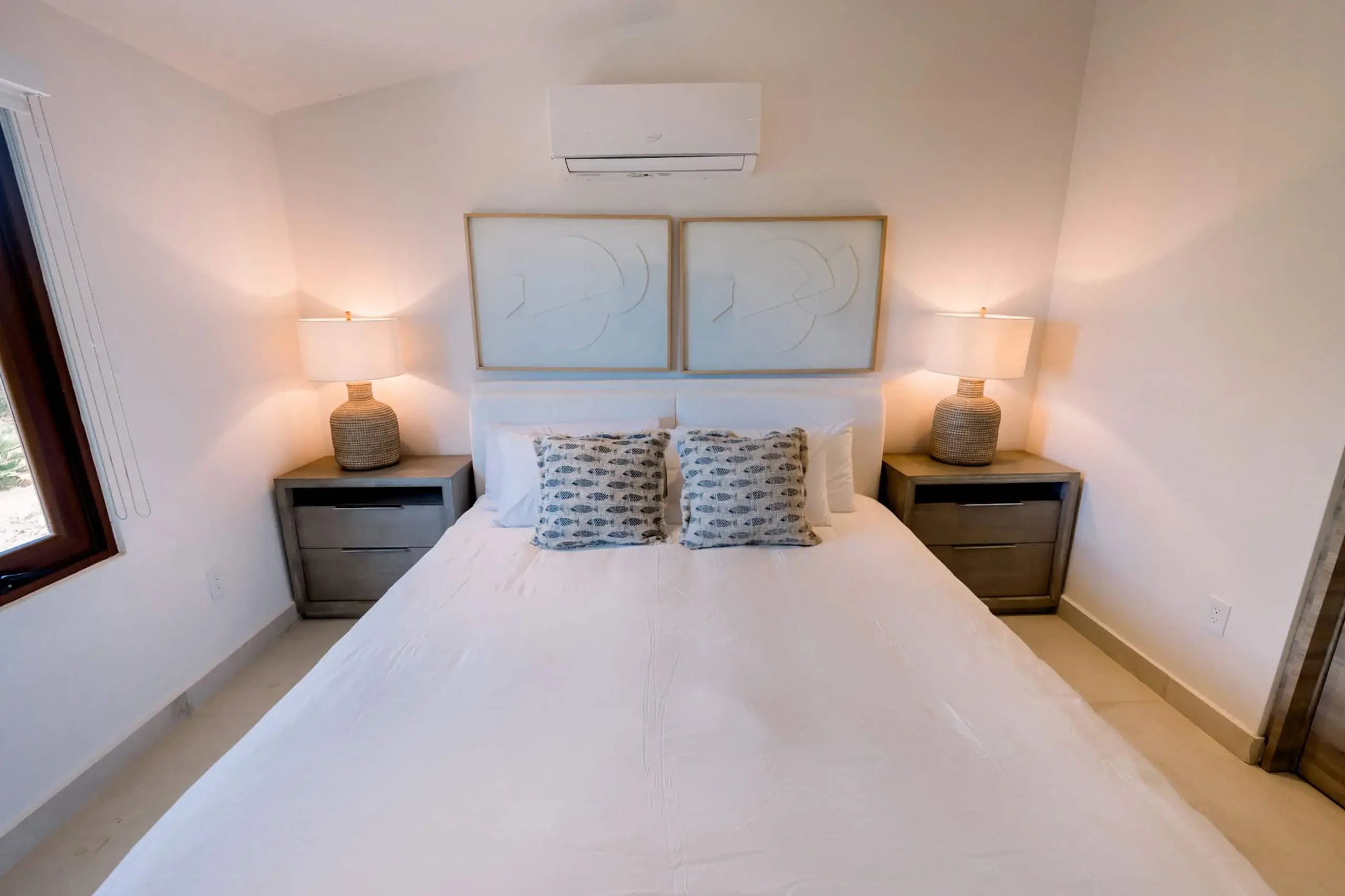 Bedroom two with twin bedside lamps