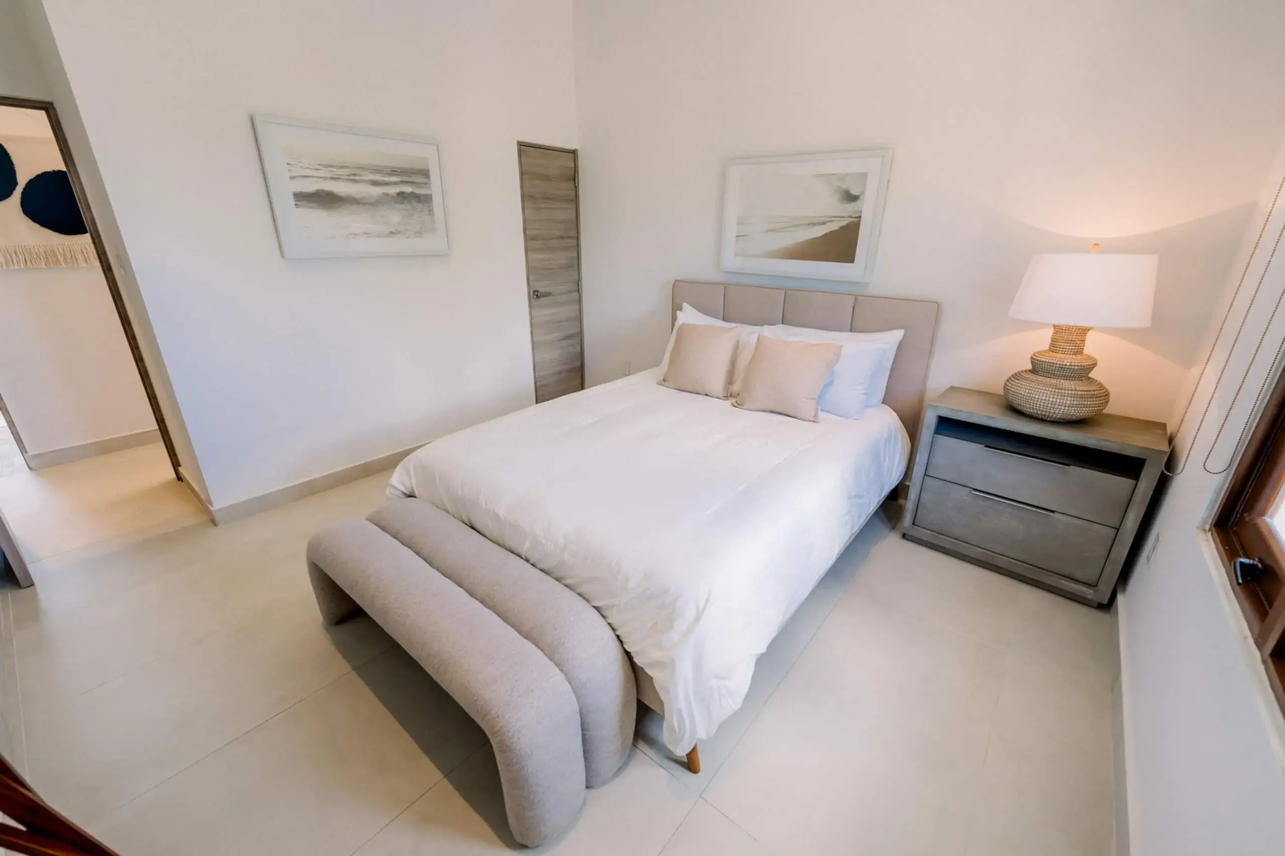 Bedroom three queen bed and bedside tables