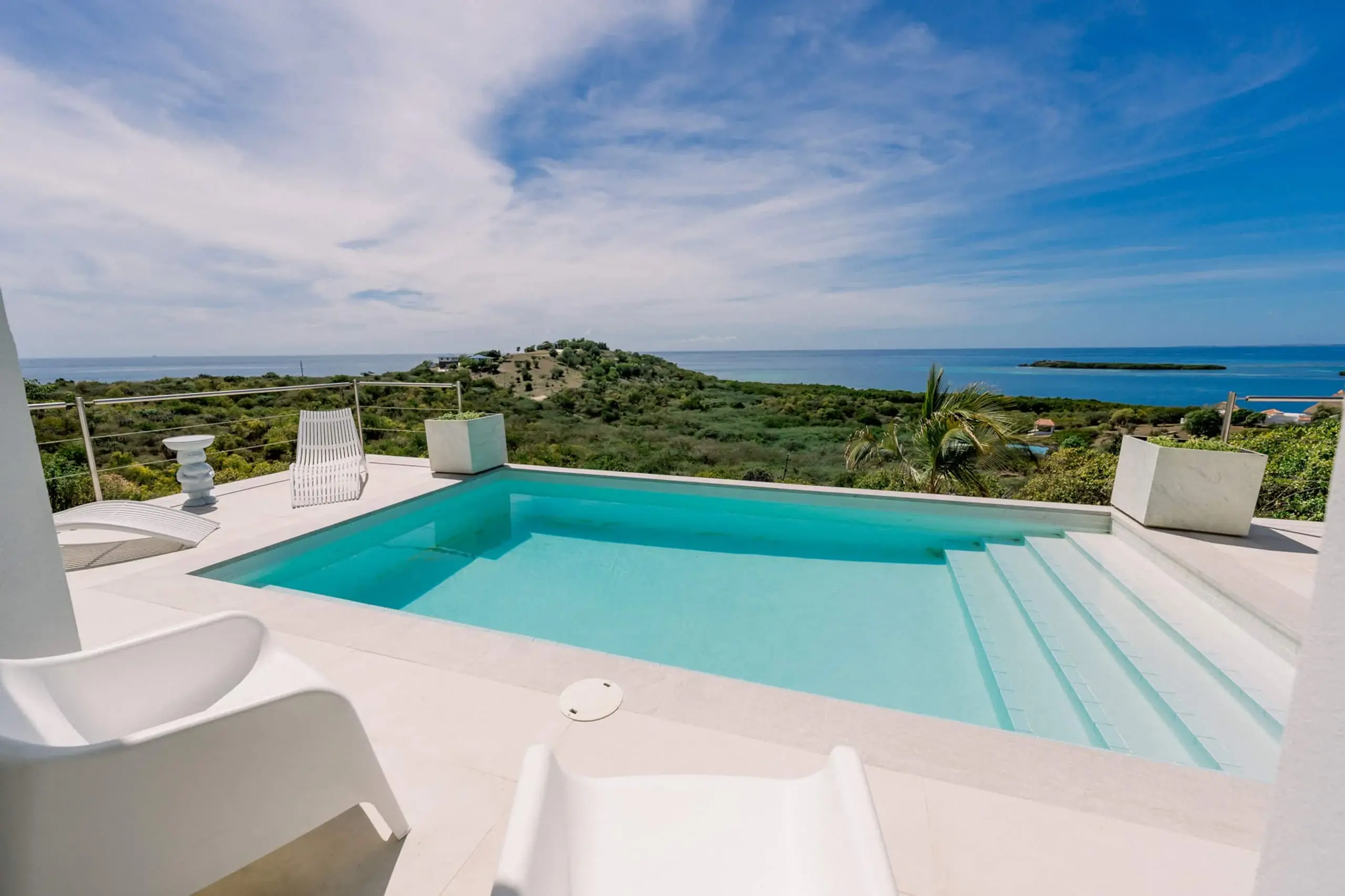 Wide pool steps and coastal landscape